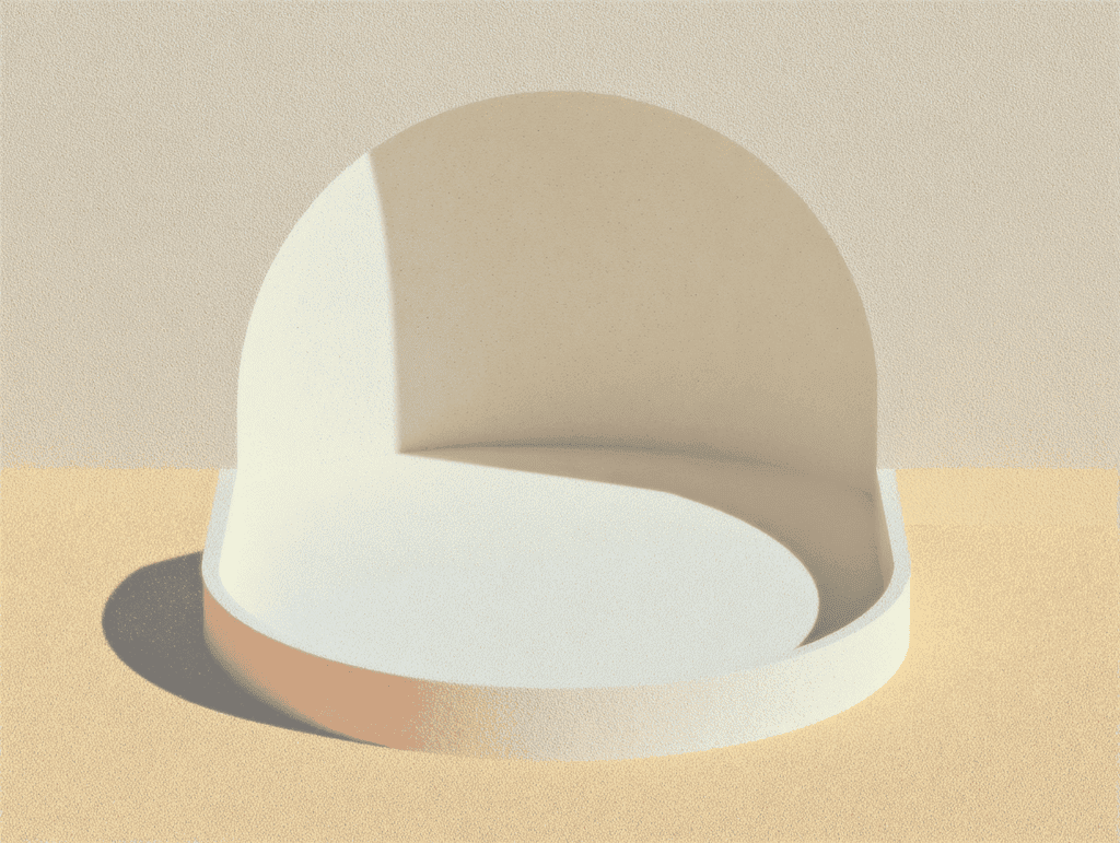 Une voussure blanche en forme de demi-dôme se dresse sur un disque circulaire, sur fond sableux uni, avec une ombre douce portée à droite.